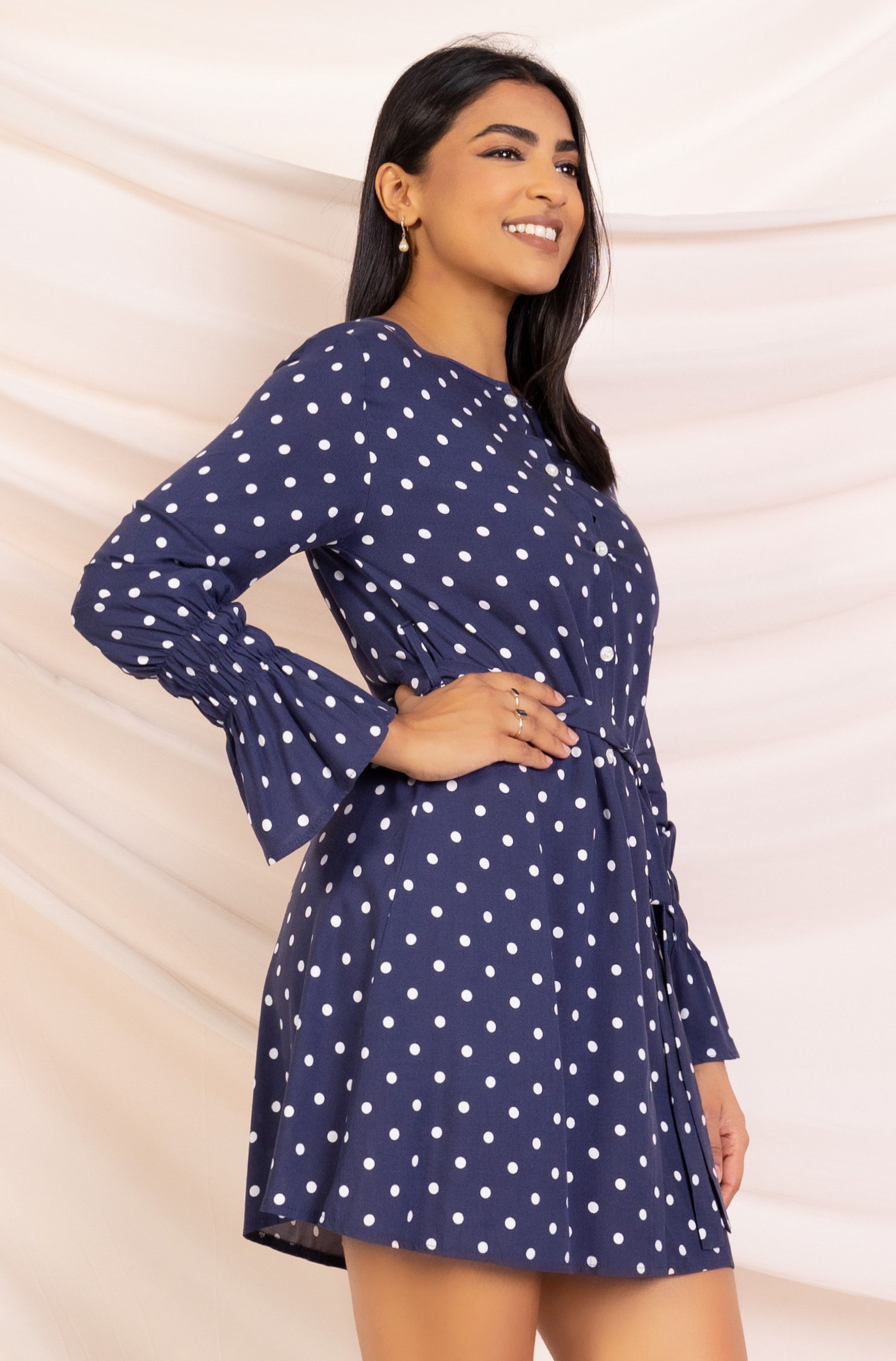 Blue and white polka dot mini dress