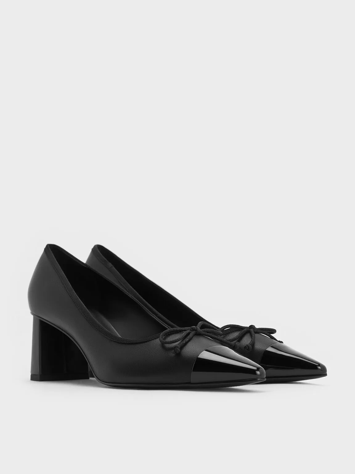 Black Pointed Cap-Toe Pumps