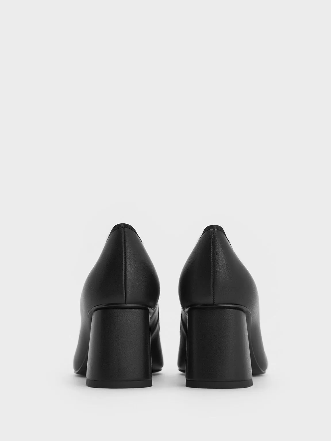 Black Pointed Cap-Toe Pumps