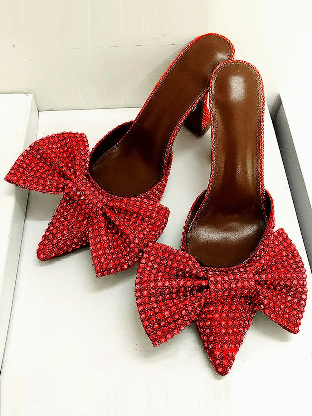 Bow high heel pumps