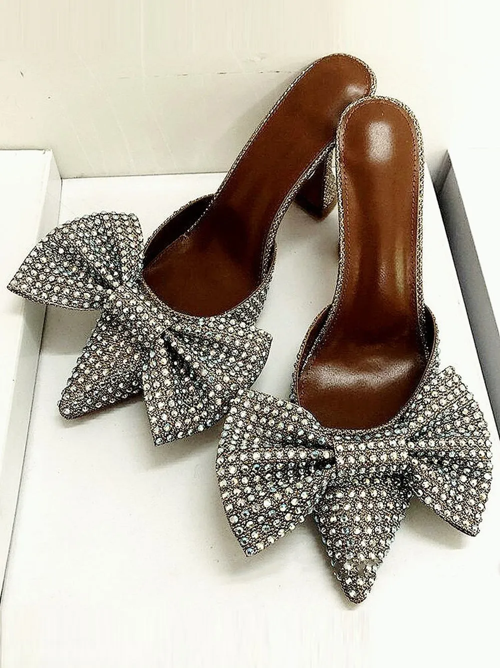 Bow high heel pumps