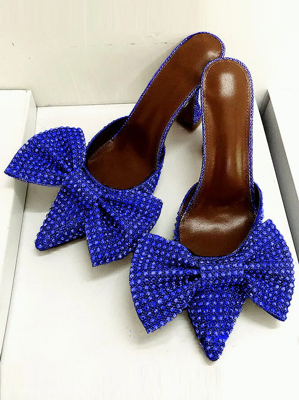 Bow high heel pumps